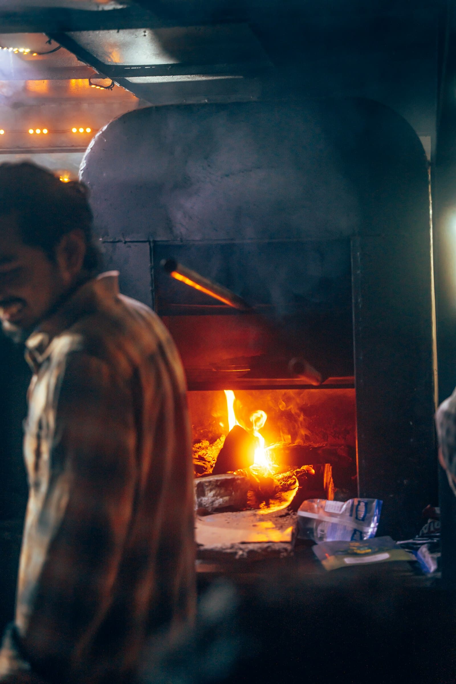 Cooking at the wood-fired oven